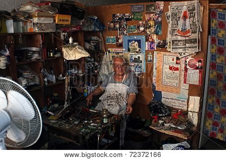 Old shoe repairman