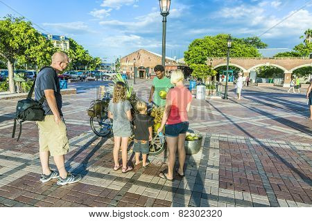 People Enjoy The Sunset Point At Mallory Square In Key Wes