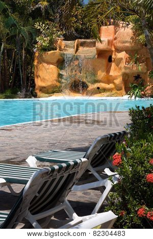 Tropical Pool Scene With Waterfall