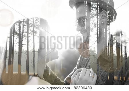 Double exposure of lovely romantic couple in nature for Valentine