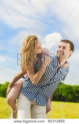 Youth Lifestyle, Summer Vacations, Dating, Love, Happiness Concepts. Happy Caucasian Couple Piggybac
