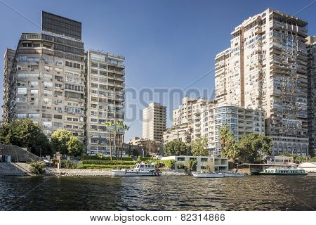 Tower Blocks On The Banks Of The River Nile