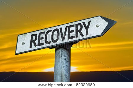 Recovery sign with a sunset background