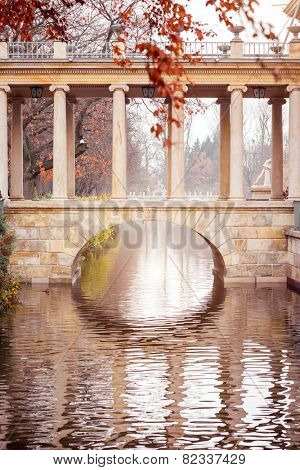 Bridge connecting east bank with Palace on the Water in the Royal Baths Park in Warsaw, Poland