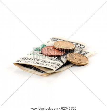 Paper money and coins isolated on white