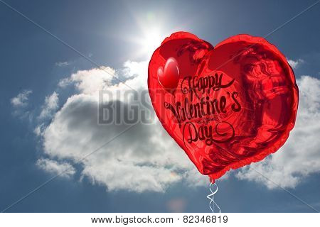 Cute valentines message against blue sky with clouds and sun