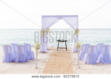 beautiful wedding arch, cabana on sand beach, outdoor beach wedding