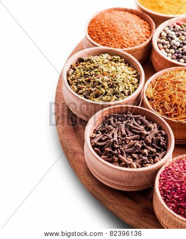 Assorted Spices In A Wooden Bowl Close-up