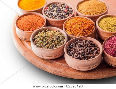 Set Spices In A Wooden Bowl Close-up