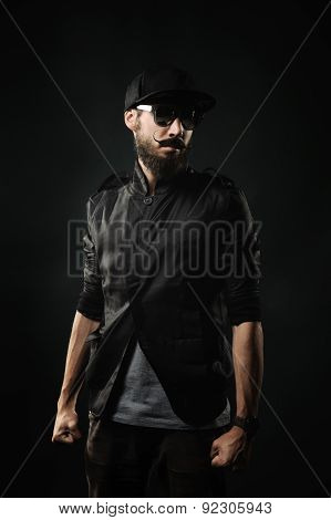 Brutal Bearded Man Wearing A Cap