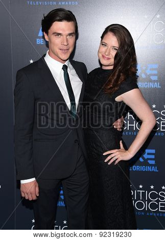 LOS ANGELES - MAY 31:  Finn Wittrock & Sarah Roberts arrives to the Critic's Choice Television Awards 2015  on May 31, 2015 in Hollywood, CA                