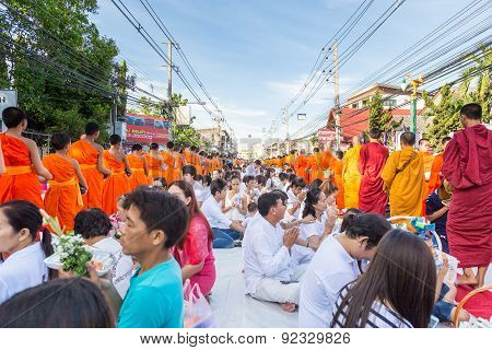 Many people give food and drink for alms to 1536 Buddhist monks in visakha bucha day