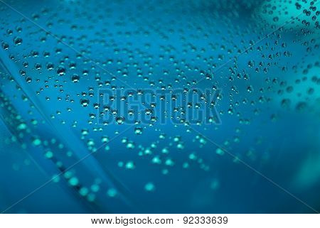 Air bubbles in water with blue background