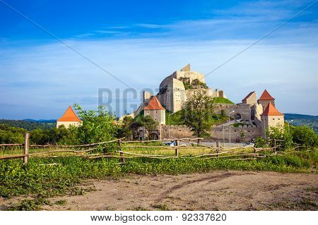 Old Medieval Fortress On Top Of The Hill, Rupea Village Located In Transylvania