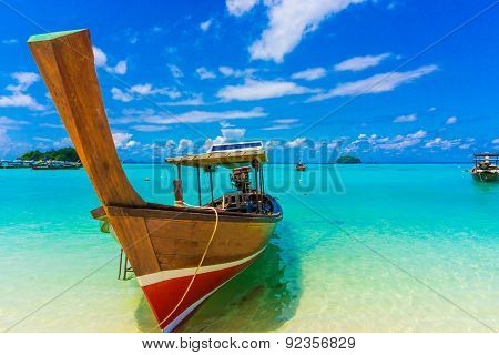 Wood Boat And Islands In Andaman Sea Against Blue Sky At Lipe