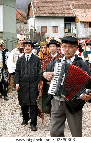 People In Traditional Costumes Celebrating The Winter Carnival