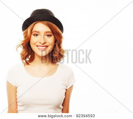 life style, happiness, emotional and people concept: Beautiful young  woman wearing white shirt and black hat looking at camera and make different emotions while standing against white background