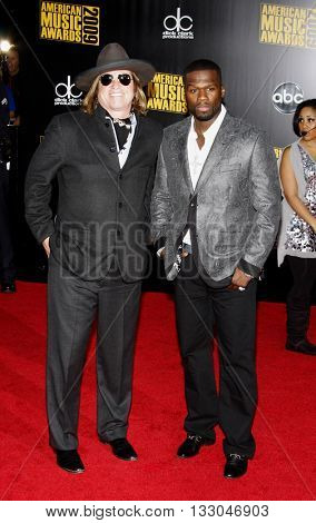 Val Kilmer and 50 Cent at the 2009 American Music Awards held at the Nokia Theater in Los Angeles, USA on November 22, 2009.  