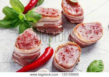 raw pork tenderloin medallions with bacon fillet steak
