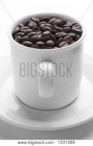 Kop fuld af kaffebønner