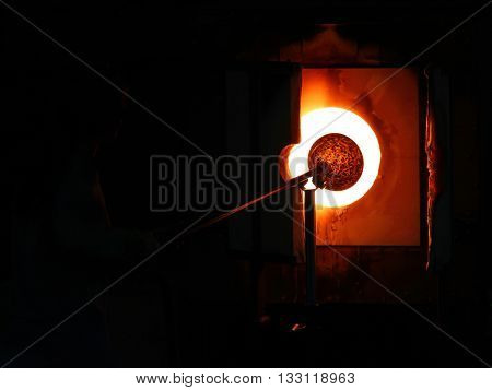 glass blast furnace hot and hard worker