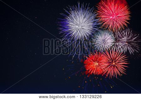 Celebration fireworks over night sky copy space. Celebration colorful fireworks. Beautiful fireworks. Holidays salute. 4 of July. 4th of July. Independence Day. New Year.