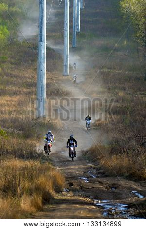 Vladivostok, Russia - may 1, 2014: cars, motorcycles, ktm Enduro and ATV, go off-roading in five-day race Russian rally 2014