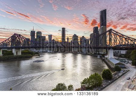 BRISBANE, AUSTRALIA - NOVEMBER 11 2013: Day to night transition of Brisbane cityscape and Story Bridge