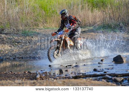 Vladivostok, Russia - may 1, 2014: cars, motorcycles, ktm Enduro and ATV, go off-roading in five-day race Russian rally 2014