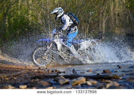 Vladivostok, Russia - may 1, 2014: cars, motorcycles, ktm Enduro and ATV, go off-roading in five-day race Russian rally 2014