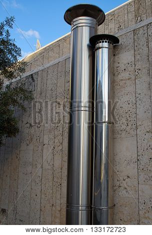 Ventilation system metal pipes of a small public building
