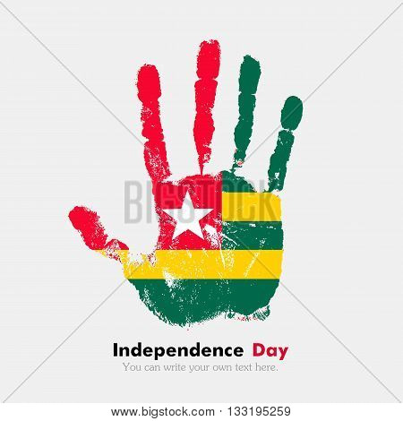 Hand print, which bears the Flag of Togo. Independence Day. Grunge style. Grungy hand print with the flag. Hand print and five fingers. Used as an icon, card, greeting, printed materials.