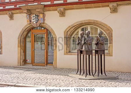 Backnang, Germany - April 3 2016: Historical townhall entrance with sculpture on the right