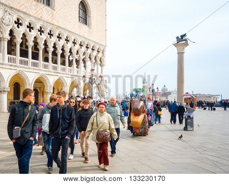 VENICE, ITALY - March 16, 2016.Tourists foot Street in Venice. its entirety is listed as a World Heritage Site, VENICE, ITALY.