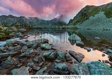 Sunset reflection in a lake in the Mont Blanc Mountains