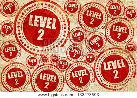 level 2, red stamp on a grunge paper texture