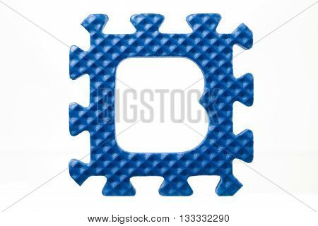 rubber alphabet puzzle on letter b isolated on a white background