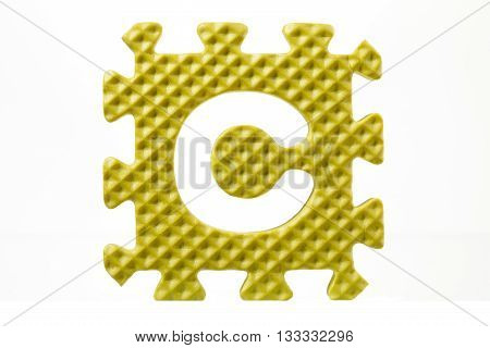 Rubber Alphabet Puzzle With A Detached Letter C