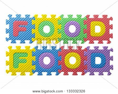 rubber puzzle forming a word food isolated on a white background