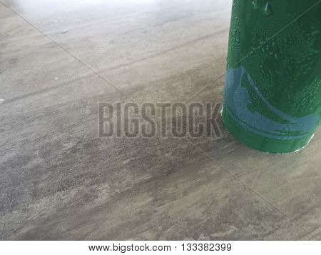 Water drop on Coffee cup on table