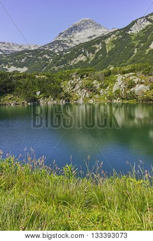 Amazing panorama of Muratov peak and Okoto lake, Pirin Mountain, Bulgaria