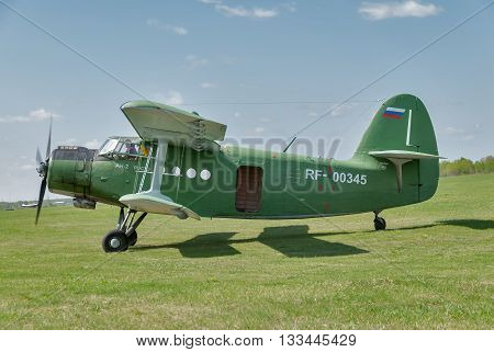 Yalutorovsk, Russia - May 24. 2008: AN-2 airplane with paratroopers onboard prepares for take-off. Sport aerodrome