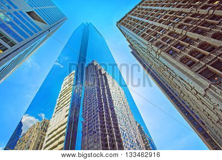 Bottom-up View Of Skyscrapers Reflected In Glass In Philadelphia
