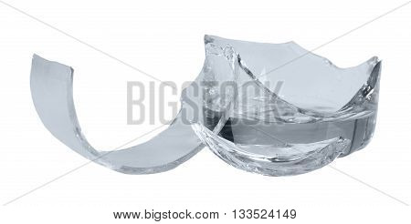 Fragments of broken glass close-up isolated on white background.