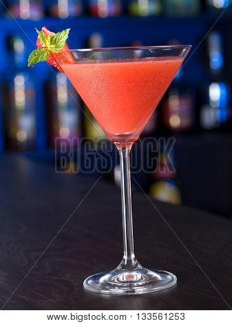 Strawberry Daiquiri made from 1/2 oz strawberry schnapps 1 oz light rum 1 oz lime juice 1 tsp powdered sugar 1 oz strawberries