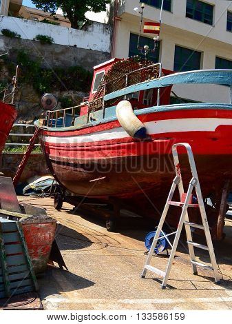 Colorful old boat in Galicia, Spain. Photo taken on: June 6th, 2016
