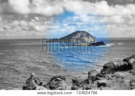 Blue Oahu Hawaii with remote Island in view.