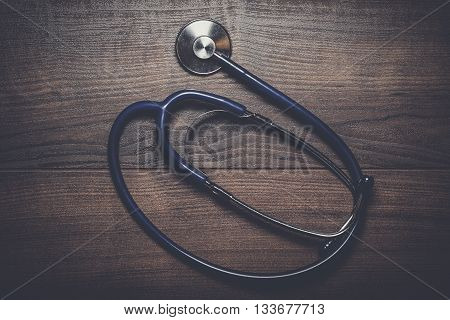statoscope on the brown wooden table background