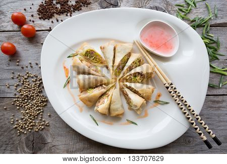 Vietnamese fried springroll served with chili sauce