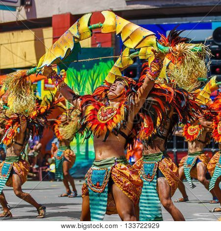 January 24th 2016. Iloilo Philippines. Festival Dinagyang. Unidentified people on parade in carnival costumes. Documentary Editorial Image.